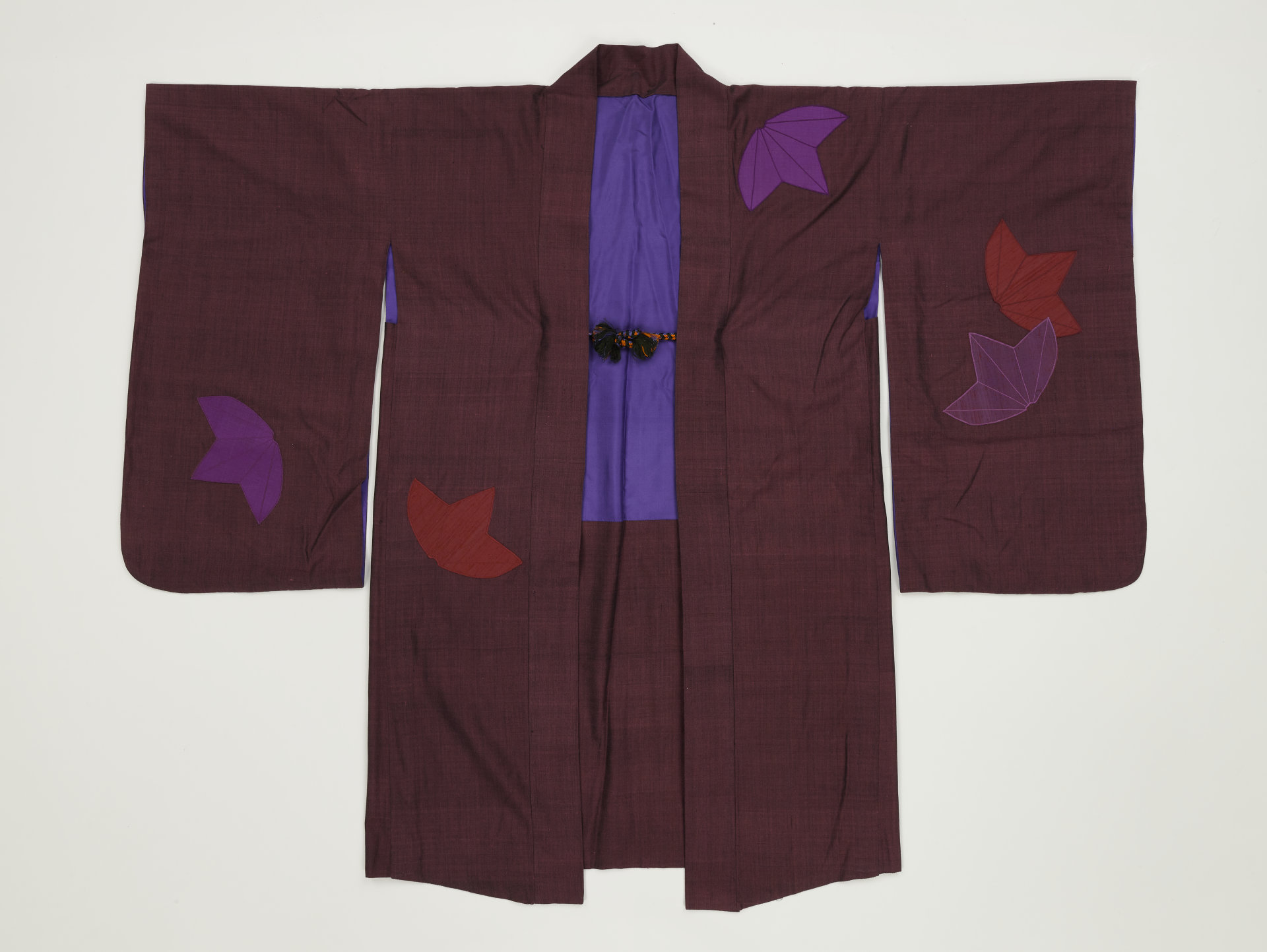 A Khersonese silk kimonos designed by Mrs Patricia Mary Meadows, with autumn leaf motifs. Gift of Patricia Mary Meadows. Collection of National Museum of Singapore, National Heritage Board.